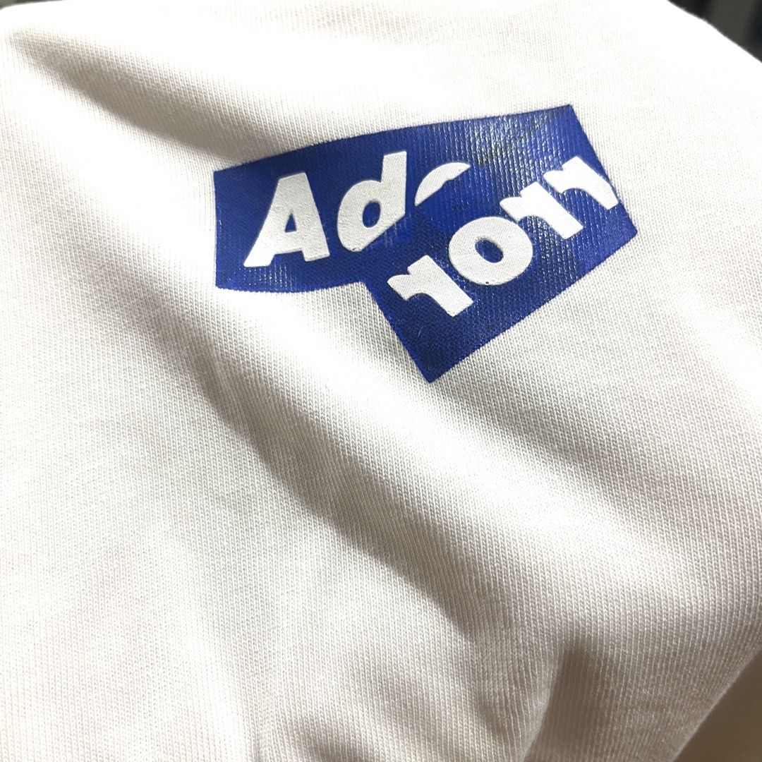 Ader Error (Category: Tshirts & Polo Shirts ) located in Bacoor. Submitted by manonghits_2000 (Listing ID 1460745932, Image 3). Description: Ader Error Measurement: 21x26.5 Color: White Color Rate: 9.5/10 Condition: Excellent Issue: None Claim 300.