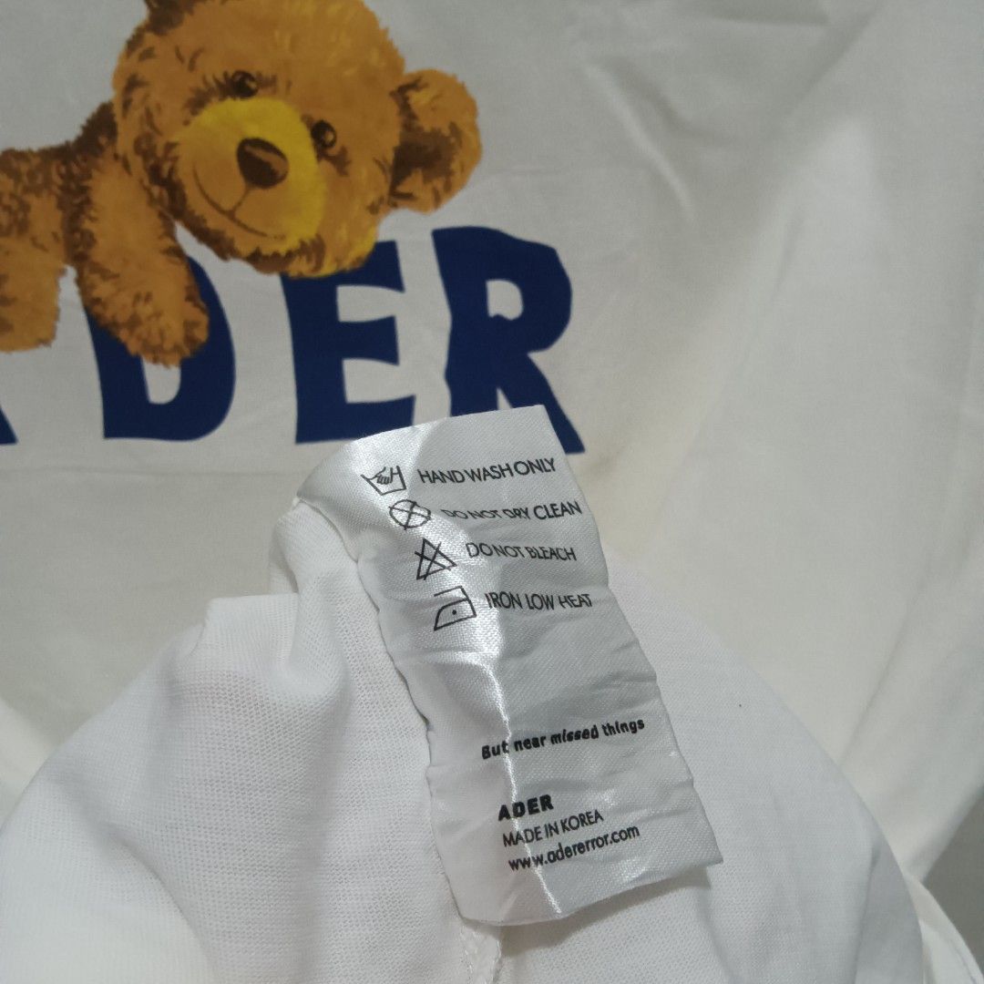 ADER ERROR Bear Shirt (Category: Tshirts & Polo Shirts ) located in Quezon City. Submitted by jaychingsss (Listing ID 1460911146, Image 2). Description: Ader Error Bear Shirt - 100 21x27 Complete Tags NEED WASH.
