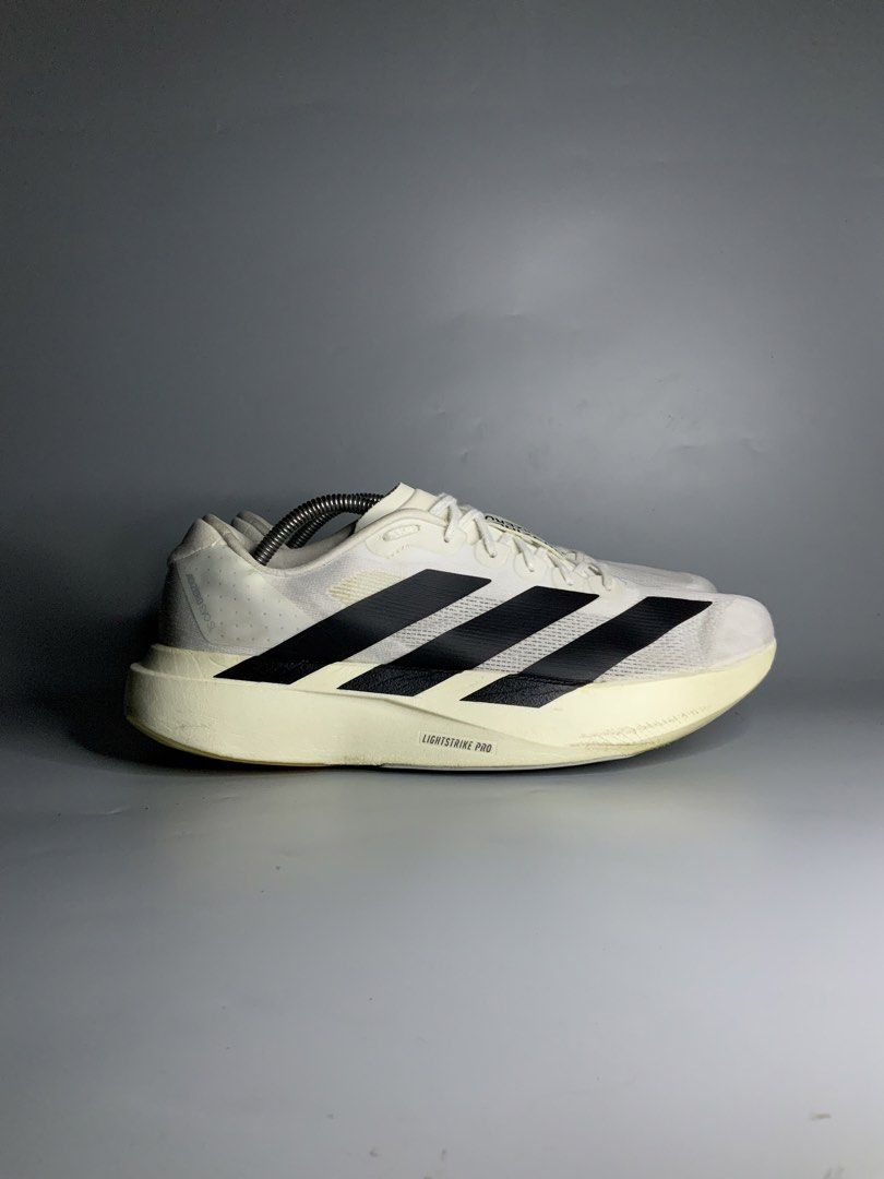 Adidas Adizero Evo Sl (Category: Sneakers) located in Cavite. Submitted by kalye_footwear (Listing ID 1460728736, Image 2). Description: - Adidas Adizero Evo Sl - Us 10.5 / Euro 44.5 / Cm 28.5 - Color: White with black stripes - Cushioning: Lightstrike Pro - Ideal for running - Shows some signs of wear on sole and upper.