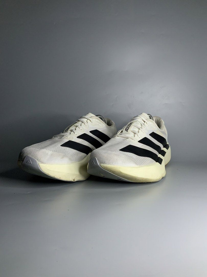 Adidas Adizero Evo Sl (Category: Sneakers) located in Cavite. Submitted by kalye_footwear (Listing ID 1460728736, Image 3). Description: - Adidas Adizero Evo Sl - Us 10.5 / Euro 44.5 / Cm 28.5 - Color: White with black stripes - Cushioning: Lightstrike Pro - Ideal for running - Shows some signs of wear on sole and upper.