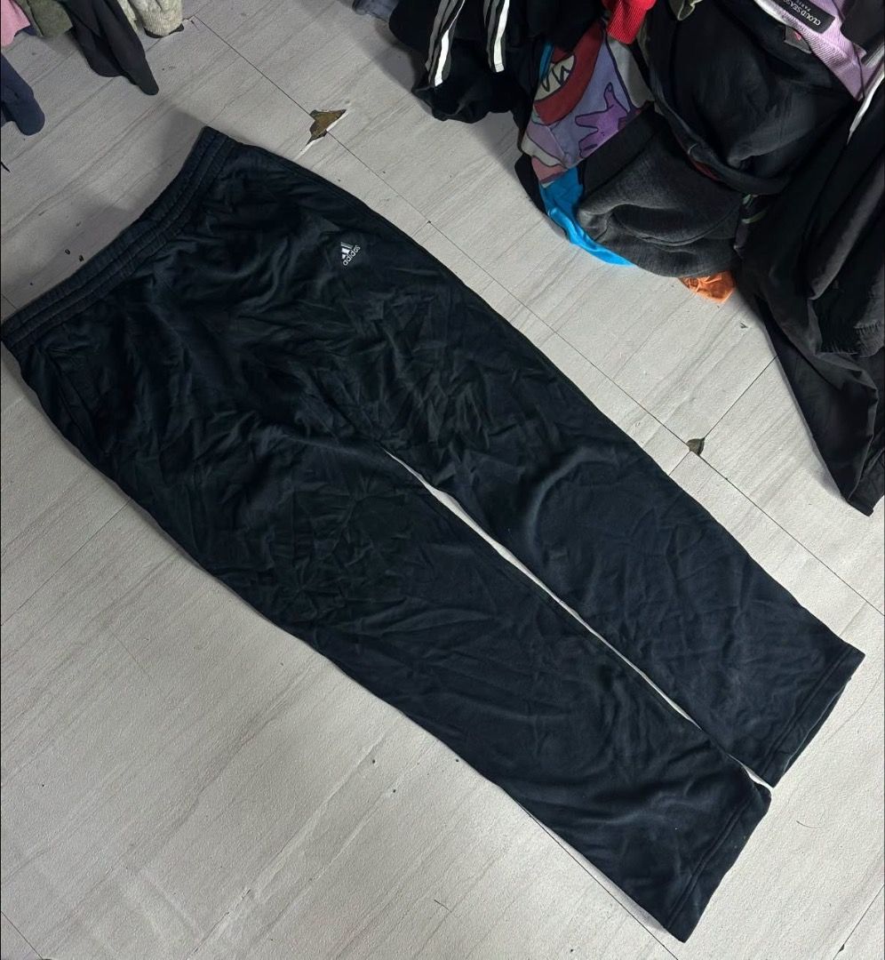 Adidas Black Jogger Pants (Category: Joggers) located in Manila. Submitted by nb_thriftshop (Listing ID 1460893150, Image 1). Description: adi sweat pants waist 30 to 40 has lace and garterize length 42.5 leg hole 7.5 no issue need wash.