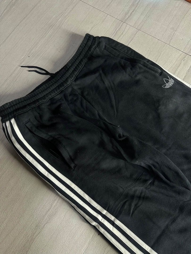 Adidas Black jogging Pants with White Stripes (Category: Other Bottoms) located in Manila. Submitted by nb_thriftshop (Listing ID 1460891192, Image 3). Description: adi jogging pants waist 24 to 30 has lace and garter length 35 thigh 12 no issue need wash .