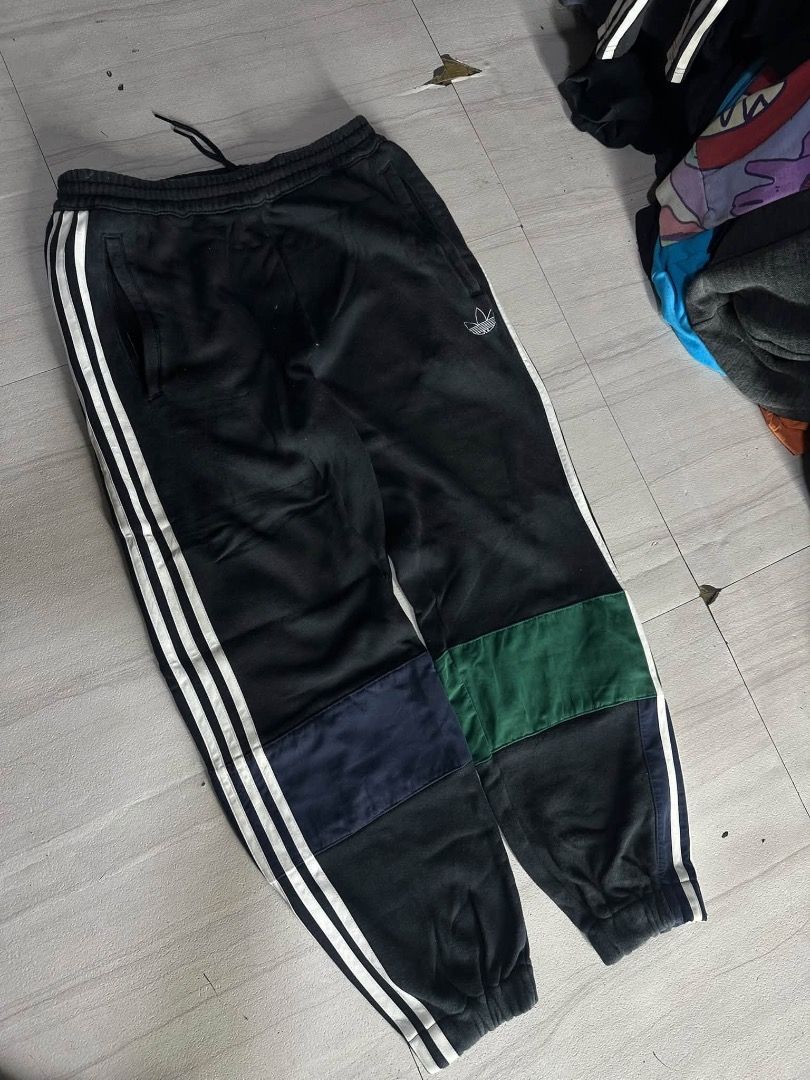 Adidas Black jogging Pants with White Stripes (Category: Other Bottoms) located in Manila. Submitted by nb_thriftshop (Listing ID 1460891192, Image 1). Description: adi jogging pants waist 24 to 30 has lace and garter length 35 thigh 12 no issue need wash .