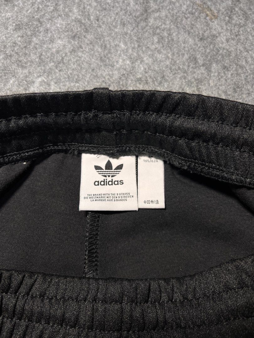 Adidas Black Shorts with White Stripes (Category: Shorts) located in Manila. Submitted by randsclothingstore (Listing ID 1460720425, Image 3). Description: BRAND: Adidas Size (Inch) ‼️Medida Size‼️ : W 28-33 | L 16.5 Color Rate: 9.8/10 Condition: Like New Issue: None ‼️ Thrifted item — please manage your expectations, authenticity is not guaranteed (check photos for tags!) 🧼 Laundered & Ready to Wear — Item has been washed and prepped, so you ca