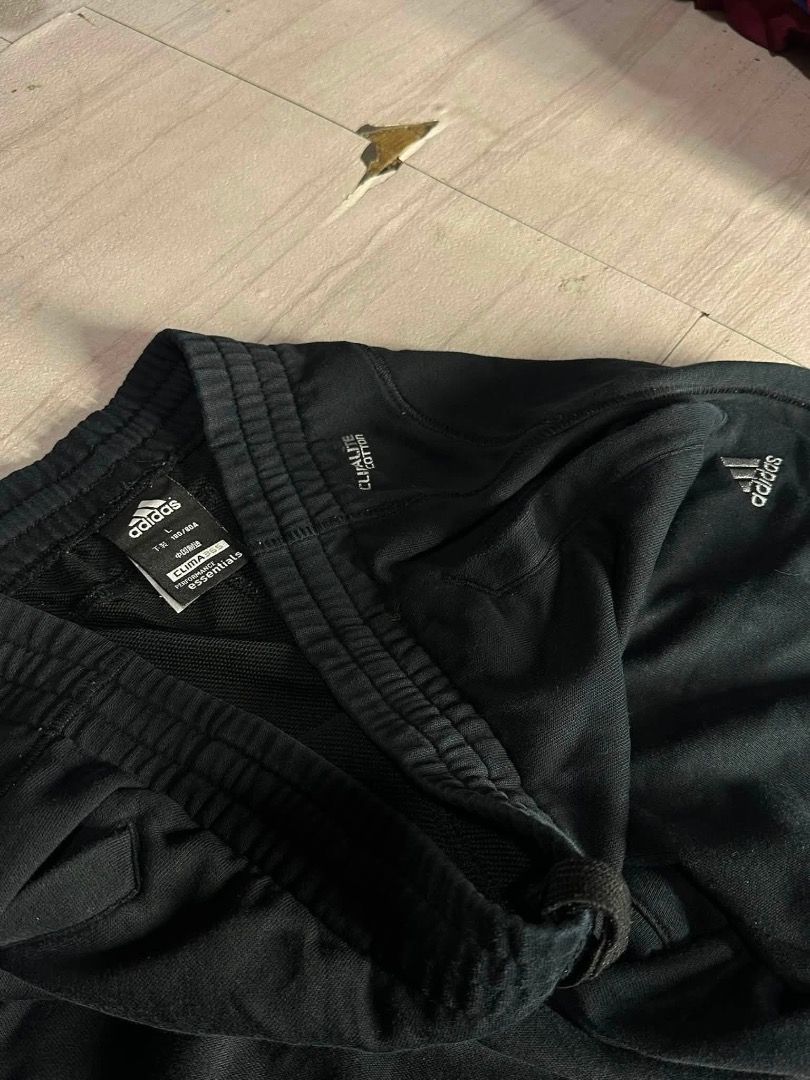 adidas black sweatpants (Category: Joggers) located in Manila. Submitted by nb_thriftshop (Listing ID 1460896879, Image 2). Description: adi sweat pants waist 27 to 35 has lace and garter length 41 leg hole 8.5 no issue need wash.