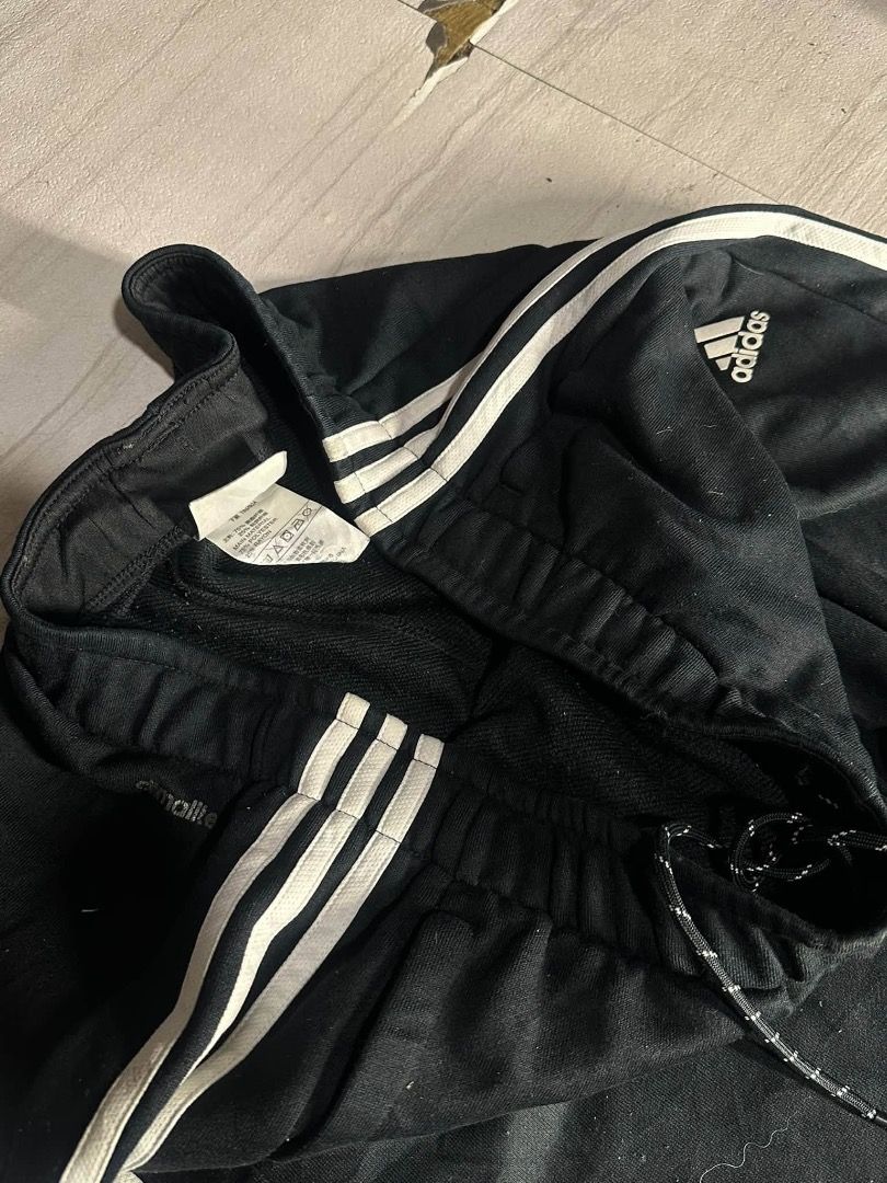 Adidas Black Track Pants with White Stripes (Category: Other Bottoms) located in Manila. Submitted by nb_thriftshop (Listing ID 1460892184, Image 3). Description: adi sweat pants waist 30 to 38 has lace and garter length 42 leg hole 7.5 no issue need wash .
