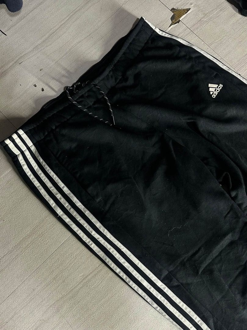 Adidas Black Track Pants with White Stripes (Category: Other Bottoms) located in Manila. Submitted by nb_thriftshop (Listing ID 1460892184, Image 2). Description: adi sweat pants waist 30 to 38 has lace and garter length 42 leg hole 7.5 no issue need wash .