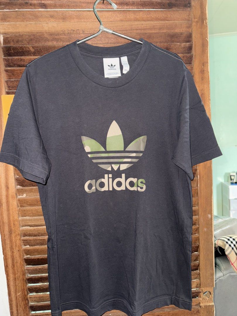 Adidas camouflage shirt (Category: Shirts) located in San Pedro. Submitted by vennizventura (Listing ID 1460764904, Image 1). Description: Size S in tag but can fit up to Medium Guaranteed authentic No flaws Please note: Color may slightly vary in photos due to lighting. 😊.