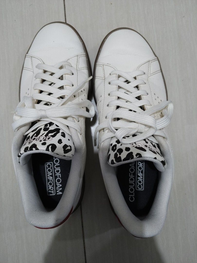Adidas Cloudfoam Comfort Sneakers White Leopard Print (Category: Sneakers) located in Quezon City. Submitted by littlekiboo (Listing ID 1460777384, Image 1). Description: - White Adidas sneakers with a stylish leopard print accent on the tongue. - Cloudfoam Comfort insoles for superior cushioning. - Durable gum sole for everyday wear. - Classic perforated Adidas stripes on the side. - Eye-catching red Adidas logo detail on the heel. - Ideal for c