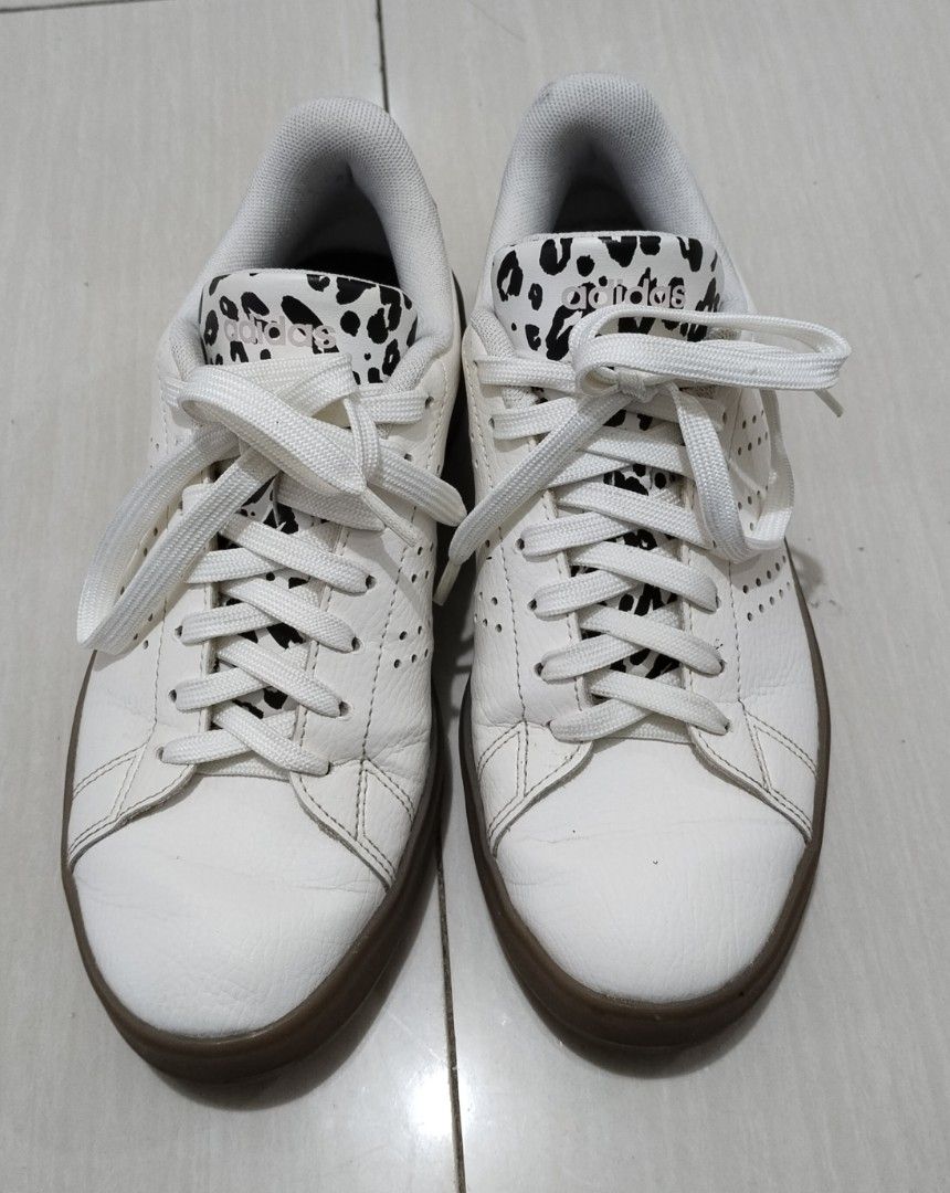 Adidas Cloudfoam Comfort Sneakers White Leopard Print (Category: Sneakers) located in Quezon City. Submitted by littlekiboo (Listing ID 1460777384, Image 2). Description: - White Adidas sneakers with a stylish leopard print accent on the tongue. - Cloudfoam Comfort insoles for superior cushioning. - Durable gum sole for everyday wear. - Classic perforated Adidas stripes on the side. - Eye-catching red Adidas logo detail on the heel. - Ideal for c