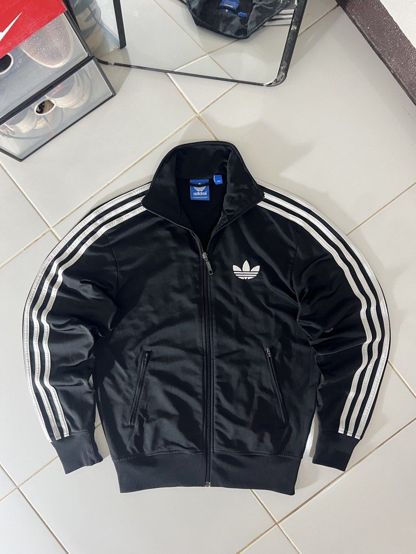 ADIDAS FIREBIRD JACKET BLACK🧥🖤 (Category: Coats, Jackets and Outerwear) located in Manila. Submitted by metromnlwear (Listing ID 1460886403, Image 2). Description: ADIDAS FIREBIRD JACKET BLACK🧥🖤 Dimes L:26” W:20” Size:M-L Excellent condition No issue Color rate:10/10 ₱1,500.