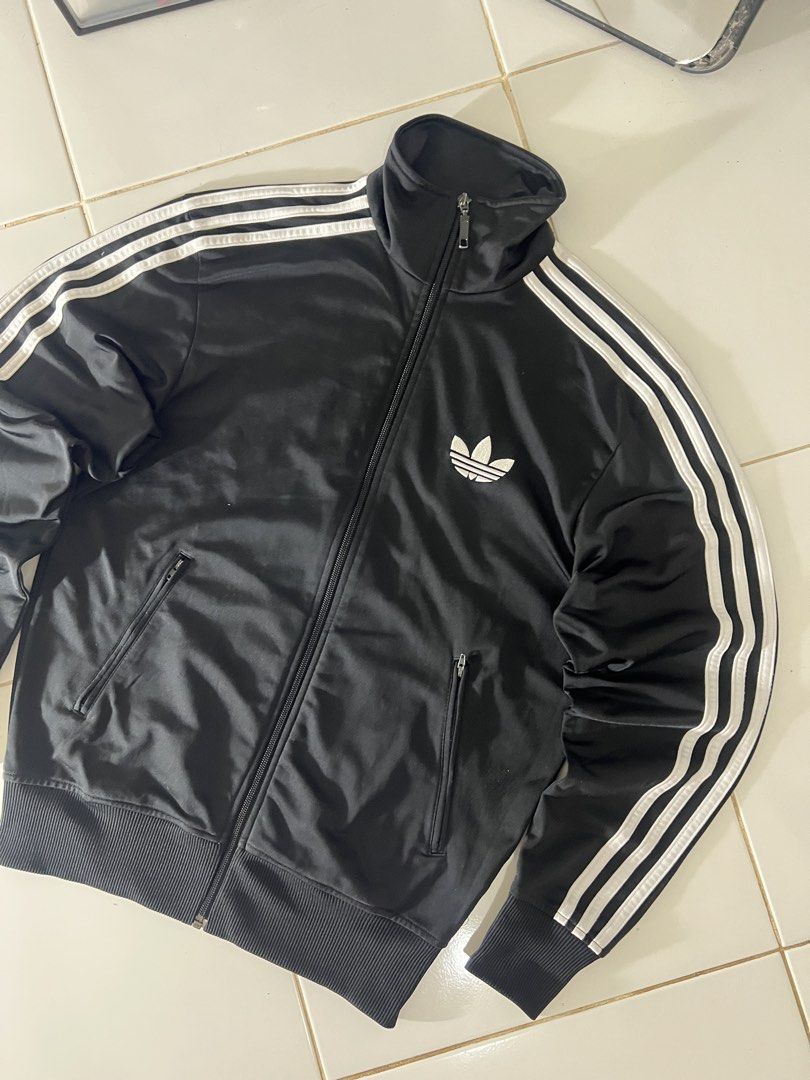 ADIDAS FIREBIRD JACKET BLACK🧥🖤 (Category: Coats, Jackets and Outerwear) located in Manila. Submitted by metromnlwear (Listing ID 1460886403, Image 3). Description: ADIDAS FIREBIRD JACKET BLACK🧥🖤 Dimes L:26” W:20” Size:M-L Excellent condition No issue Color rate:10/10 ₱1,500.