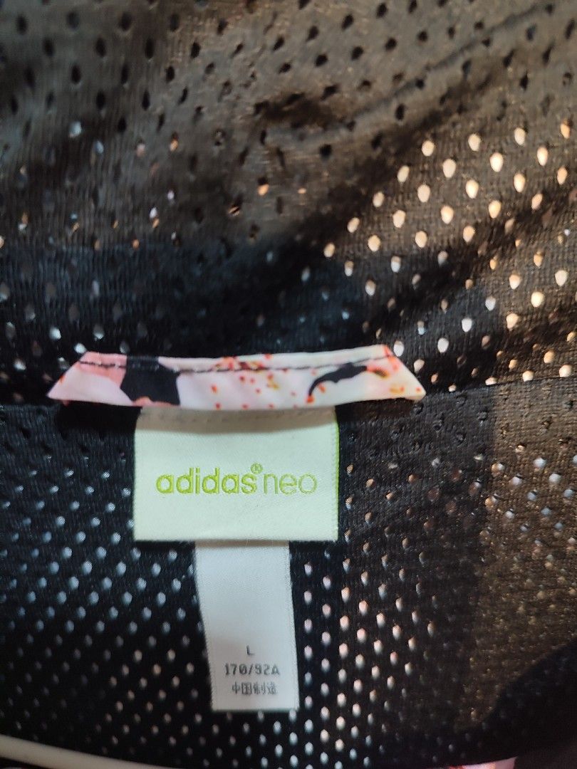 Adidas Floral Print Windbreaker Jacket (Category: Coats, Jackets and Outerwear) located in Manila. Submitted by momofunodos (Listing ID 1460835047, Image 2). Description: - Black Adidas windbreaker - Pretty pink floral print - Adidas logo scattered throughout - Lightweight and perfect for a casual look - Features a hood - Great for layering Note! buy at your own risk this is ukay kau n mg legit ✅.