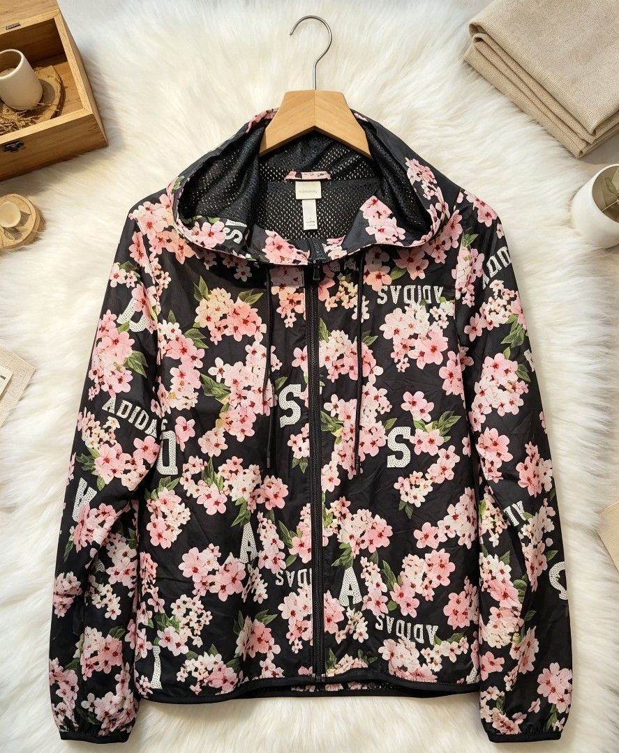 Adidas Floral Print Windbreaker Jacket (Category: Coats, Jackets and Outerwear) located in Manila. Submitted by momofunodos (Listing ID 1460835047, Image 1). Description: - Black Adidas windbreaker - Pretty pink floral print - Adidas logo scattered throughout - Lightweight and perfect for a casual look - Features a hood - Great for layering Note! buy at your own risk this is ukay kau n mg legit ✅.