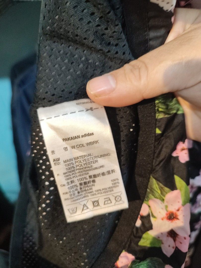 Adidas Floral Print Windbreaker Jacket (Category: Coats, Jackets and Outerwear) located in Manila. Submitted by momofunodos (Listing ID 1460835047, Image 3). Description: - Black Adidas windbreaker - Pretty pink floral print - Adidas logo scattered throughout - Lightweight and perfect for a casual look - Features a hood - Great for layering Note! buy at your own risk this is ukay kau n mg legit ✅.