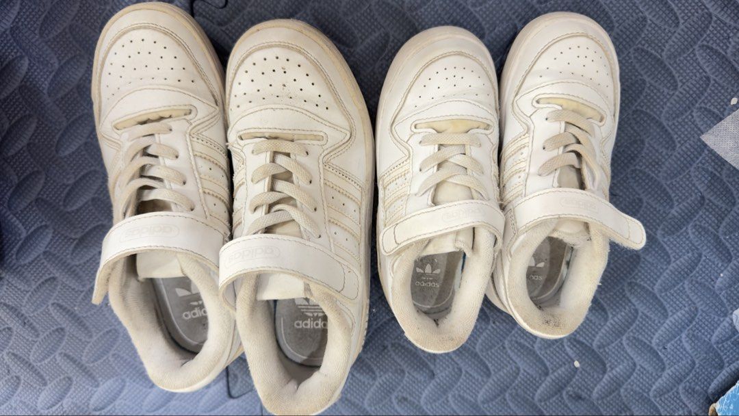 Adidas Forum Low White Sneakers (Category: Babies & Kids Fashion) located in Pasig City. Submitted by thelesslife.mnl (Listing ID 1460728678, Image 1). Description: Sizes 9.5K and US 1.5 No box Sold separately - Classic white Adidas Forum Low sneakers - Features iconic three stripes - Includes adjustable velcro strap for added support - Shows some signs of wear on soles and inner lining - Ideal for everyday casual wear.