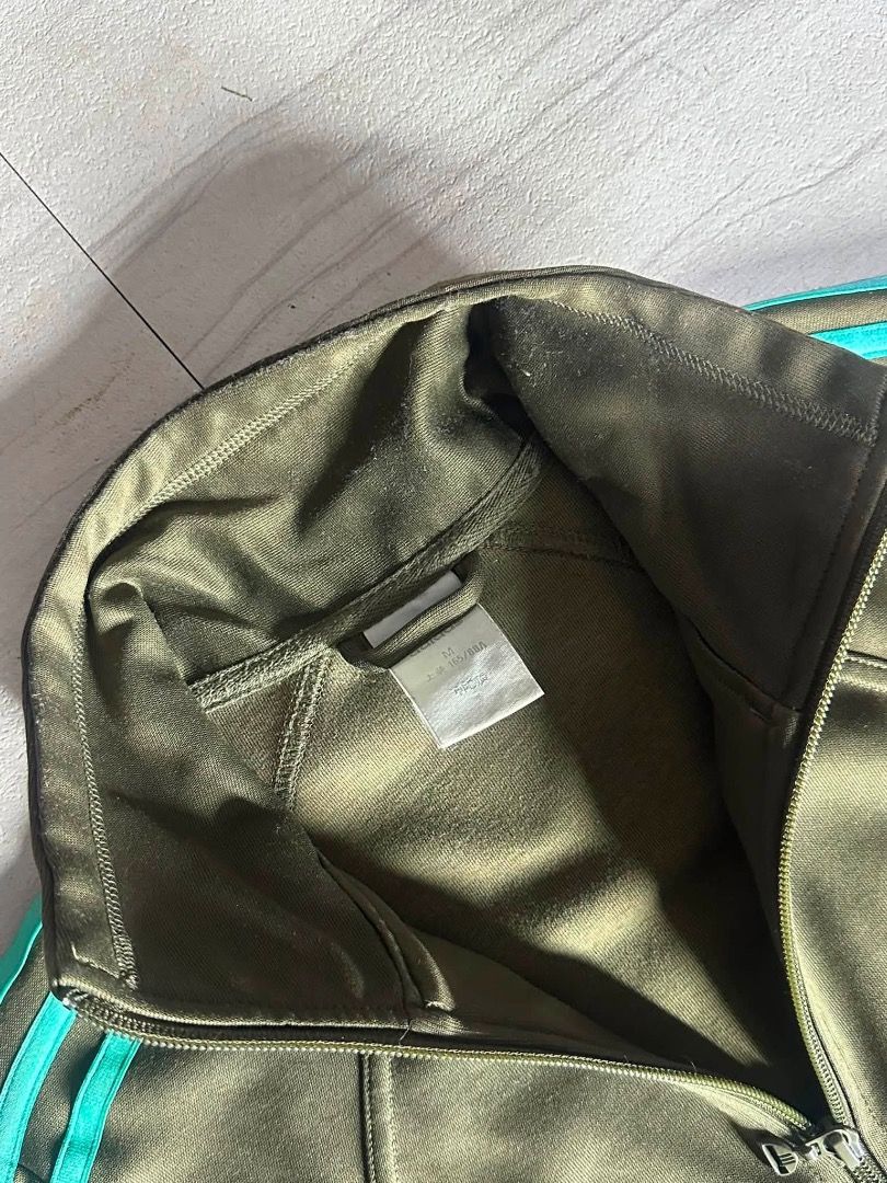 ADIDAS full zip (Category: Coats, Jackets and Outerwear) located in Manila. Submitted by nb_thriftshop (Listing ID 1460899743, Image 3). Description: adi jacket 23 length 18.5 width small to medium need wash issue : yung cut tinahi , check sa dulo ng pic .