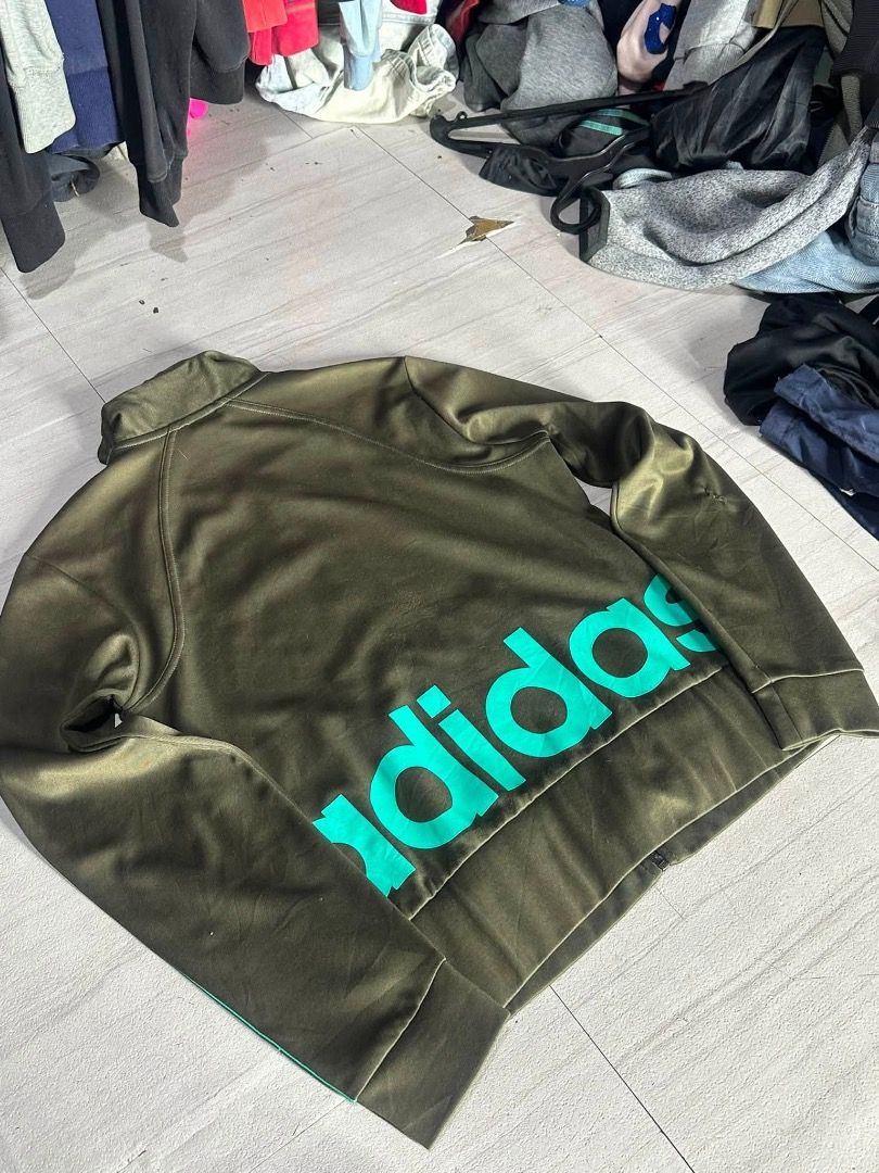 ADIDAS full zip (Category: Coats, Jackets and Outerwear) located in Manila. Submitted by nb_thriftshop (Listing ID 1460899743, Image 2). Description: adi jacket 23 length 18.5 width small to medium need wash issue : yung cut tinahi , check sa dulo ng pic .