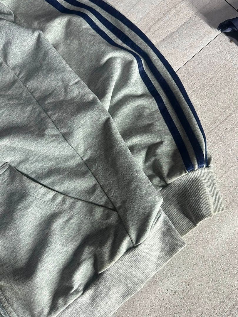 Adidas fullzip with hoodie (Category: Coats, Jackets and Outerwear) located in Manila. Submitted by nb_thriftshop (Listing ID 1460901350, Image 3). Description: adi full zip hoodie 26 length 21 width medium to large no issue need wash.