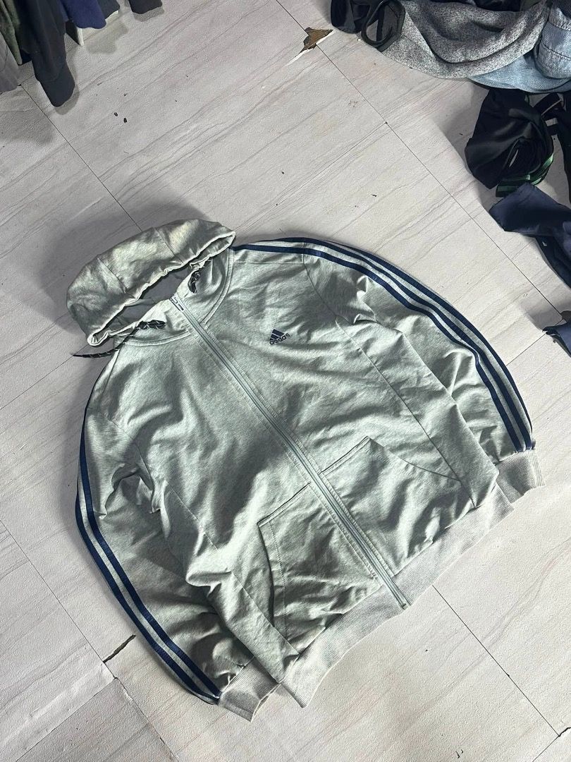 Adidas fullzip with hoodie (Category: Coats, Jackets and Outerwear) located in Manila. Submitted by nb_thriftshop (Listing ID 1460901350, Image 1). Description: adi full zip hoodie 26 length 21 width medium to large no issue need wash.
