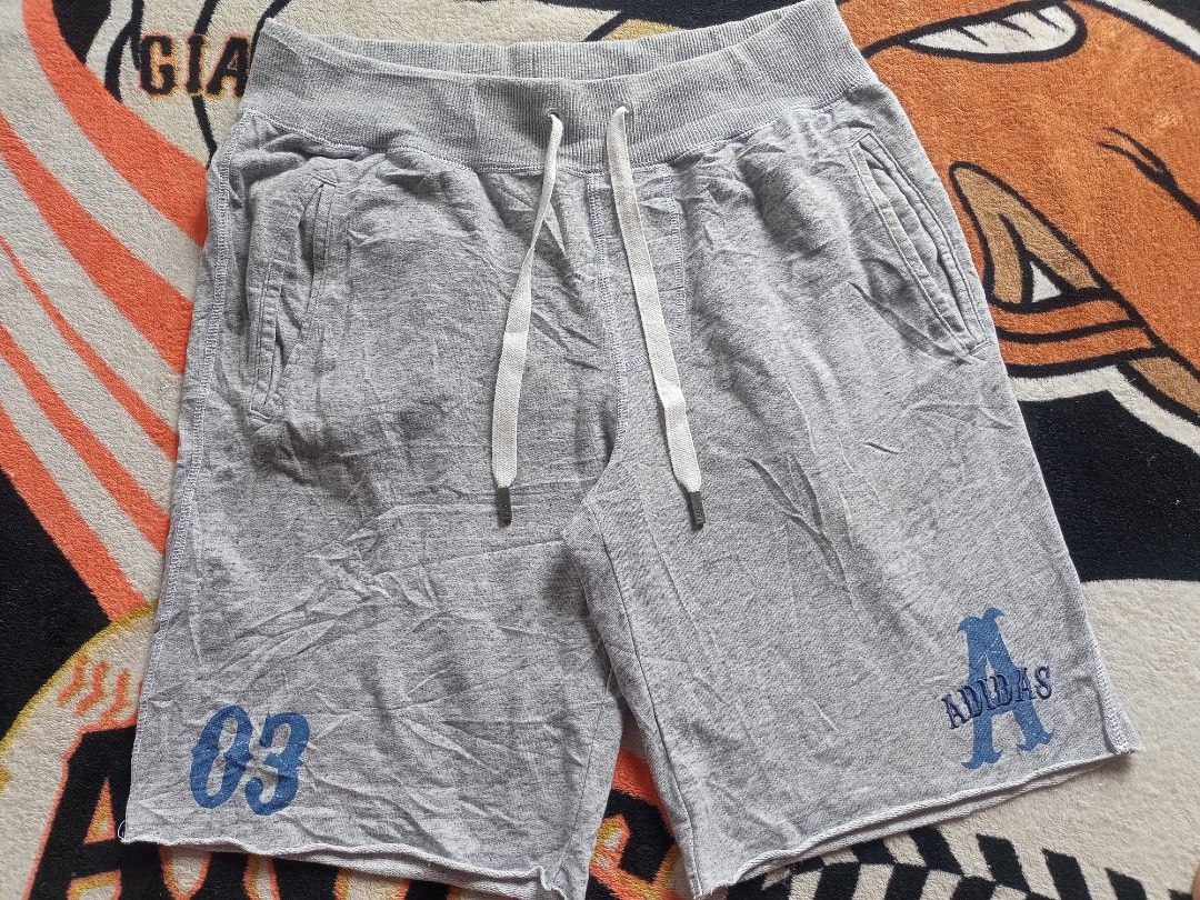 Adidas Gray Shorts (Category: Shorts) located in Castilla. Submitted by stignapamorma (Listing ID 1460836755, Image 1). Description: Branded Thrifted Cotton Shorts Size - 30-33x22 Condition - Excellent Color Rate - 9/10 Issue - None Price - 450+SF.