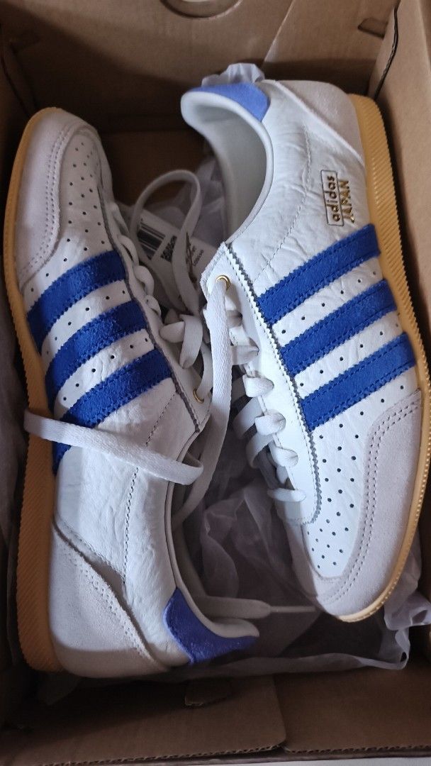 Adidas Japan Sneakers White Blue (Category: Sneakers) located in Caloocan City. Submitted by justin_fire (Listing ID 1460910169, Image 1). Description: - Authentic Adidas Japan sneakers - Classic white with blue stripes design - Durable gum sole - Includes original box and tissue paper - Ideal for everyday casual wear.