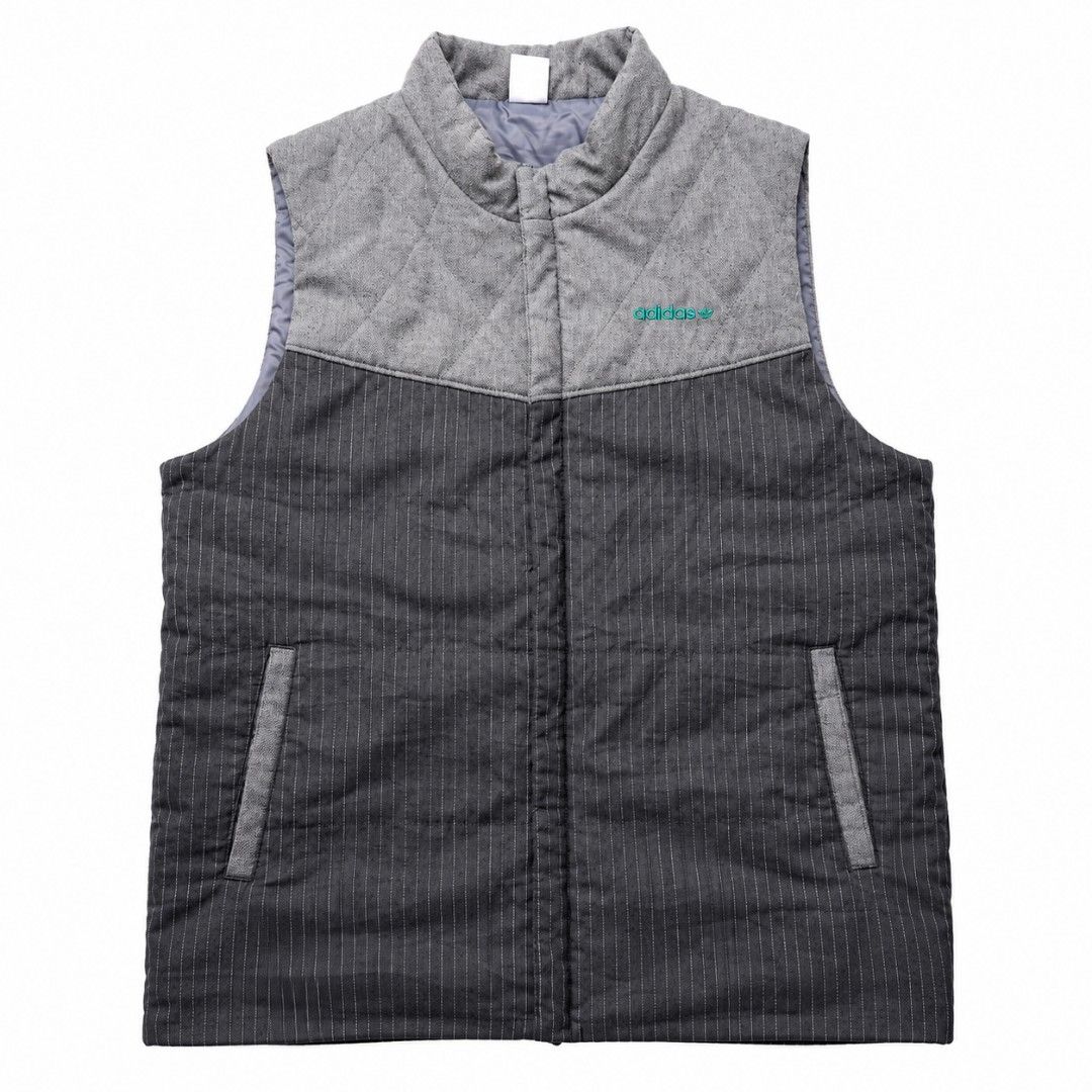 Adidas Pinstripe Quilted Vest (Category: Vests) located in Manila. Submitted by chieezz (Listing ID 1460863361, Image 1). Description: - Adidas vest - Quilted grey upper - Dark grey pinstripe lower - Two front pockets - Ideal for casual layering.