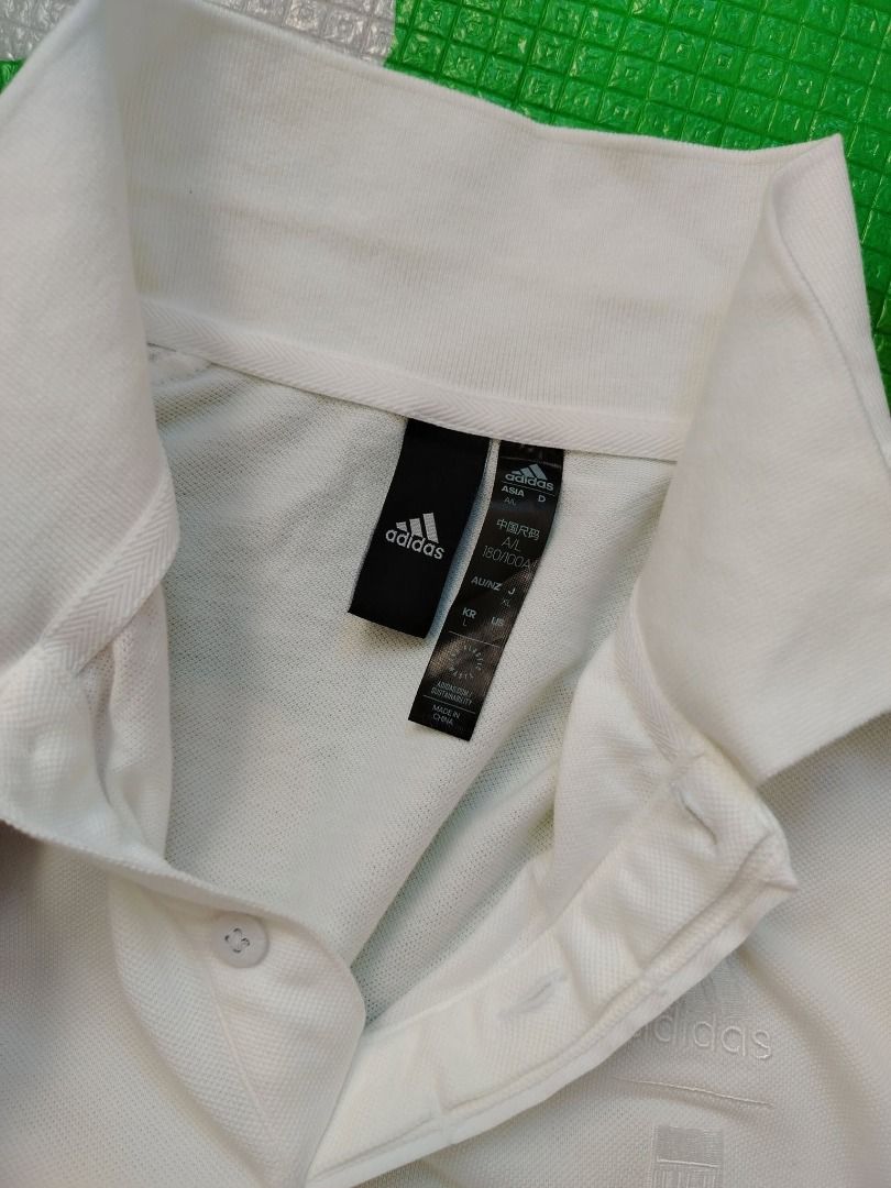 Adidas Polo Shirt (Category: Tshirts & Polo Shirts ) located in Dasmarinas. Submitted by amthriftmixph.2001 (Listing ID 1460721053, Image 2). Description: BRAND: Adidas SIZE: Large DIMES: 21.5" Width x 27 - 28" Length CONDITION: 9.5/10 COLOR RATE: 9.5/10 TAGS: With Brand Tags ISSUE: None.