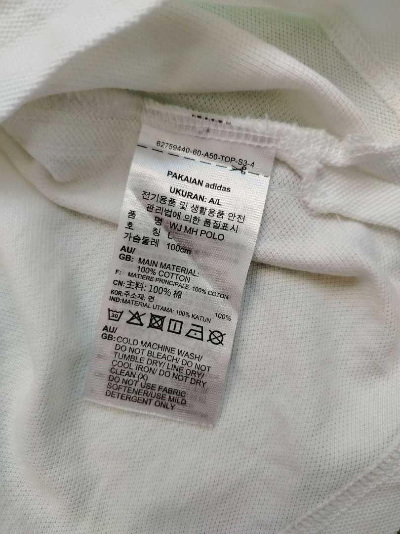 Adidas Polo Shirt (Category: Tshirts & Polo Shirts ) located in Dasmarinas. Submitted by amthriftmixph.2001 (Listing ID 1460721053, Image 3). Description: BRAND: Adidas SIZE: Large DIMES: 21.5" Width x 27 - 28" Length CONDITION: 9.5/10 COLOR RATE: 9.5/10 TAGS: With Brand Tags ISSUE: None.