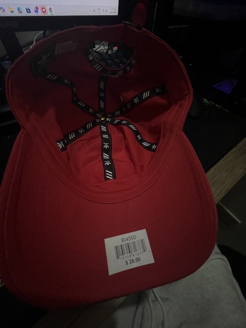 Adidas Red Cap with Trefoil Logo (Category: Caps & Hats) located in Manila. Submitted by silentforest.f104c0 (Listing ID 1460762380, Image 3). Description: - Classic red Adidas cap - Iconic embroidered trefoil logo on front - Adjustable strap for a comfortable fit - Adidas branding inside - Perfect for everyday wear - Comes with original tag.