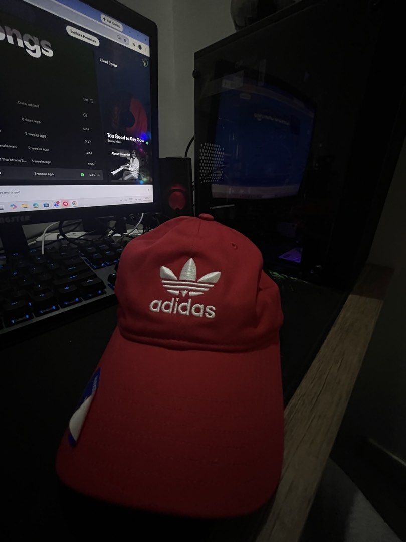 Adidas Red Cap with Trefoil Logo (Category: Caps & Hats) located in Manila. Submitted by silentforest.f104c0 (Listing ID 1460762380, Image 2). Description: - Classic red Adidas cap - Iconic embroidered trefoil logo on front - Adjustable strap for a comfortable fit - Adidas branding inside - Perfect for everyday wear - Comes with original tag.