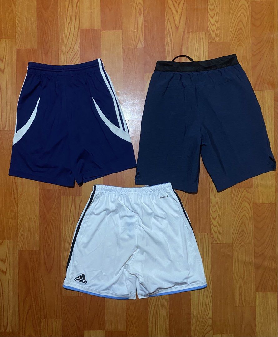 Adidas Shorts Bundle - Various Sizes & Colors (Category: Shorts) located in Cebu City. Submitted by monflor (Listing ID 1460901075, Image 3). Description: - Bundle of 6 Adidas shorts - Colors: 2 Black(XL), 1 Grey(XL), 2 Navy(XS-M), 1 White(M) - Features classic 3-stripes design on some pairs - Adjustable drawstring waists for a comfortable fit - Ideal for sports activities or everyday casual wear - Please check photos for individual styles and av