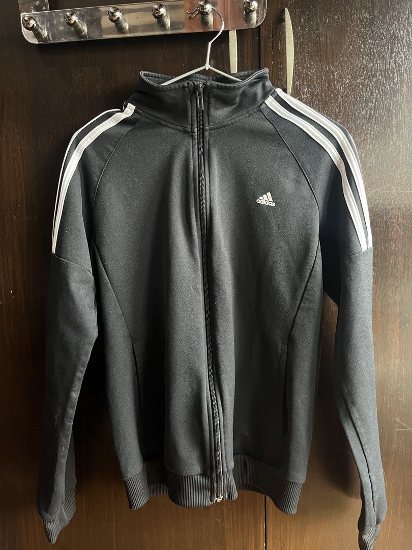 Adidas Slim Fit 3 Stripes Black Jacket (Category: Coats, Jackets and Outerwear) located in Quezon City. Submitted by shhmm (Listing ID 1460749706, Image 1). Description: adidas black jacket, zip-up, with pockets has some lint lang from laundry logos are still good, no cracks .