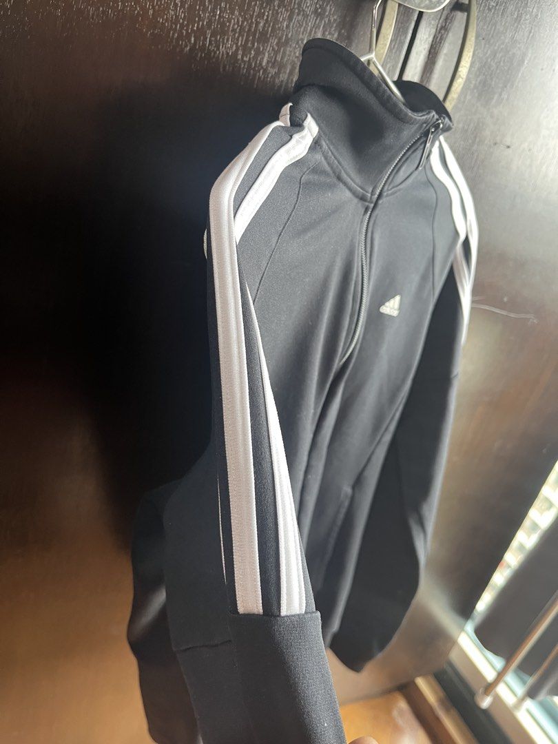 Adidas Slim Fit 3 Stripes Black Jacket (Category: Coats, Jackets and Outerwear) located in Quezon City. Submitted by shhmm (Listing ID 1460749706, Image 3). Description: adidas black jacket, zip-up, with pockets has some lint lang from laundry logos are still good, no cracks .