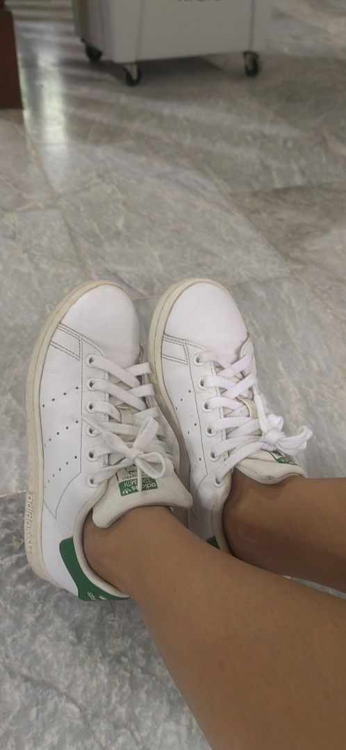 Adidas Stan Smith White Green Leather Sneakers (Category: Sneakers) located in Basista. Submitted by hupomeno (Listing ID 1460723869, Image 2). Description: - Classic white Adidas Stan Smith sneakers - Features iconic green heel tab and accents - Genuine leather upper - Original white laces - Wardrobe staple, perfect for casual outfits No more box - Shows some signs of wear, but plenty of life left.