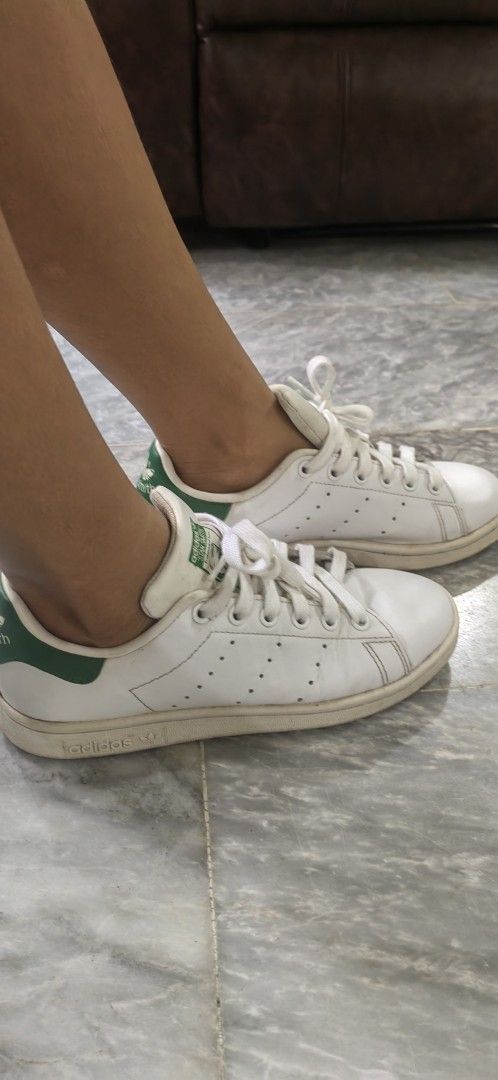 Adidas Stan Smith White Green Leather Sneakers (Category: Sneakers) located in Basista. Submitted by hupomeno (Listing ID 1460723869, Image 3). Description: - Classic white Adidas Stan Smith sneakers - Features iconic green heel tab and accents - Genuine leather upper - Original white laces - Wardrobe staple, perfect for casual outfits No more box - Shows some signs of wear, but plenty of life left.