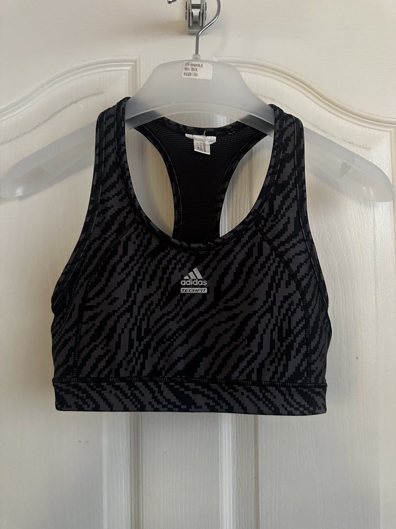 Adidas Techfit ClimaCool Sports Bra Black Grey Pattern (Category: Activewear) located in Manila. Submitted by nfcloset_ (Listing ID 1460793773, Image 1). Description: - Adidas Sports Bra - Black and grey geometric pattern - Features Techfit and ClimaCool technology for optimal performance and breathability - Racerback design for enhanced support during workouts - Comfortable and breathable material, ideal for active wear.
