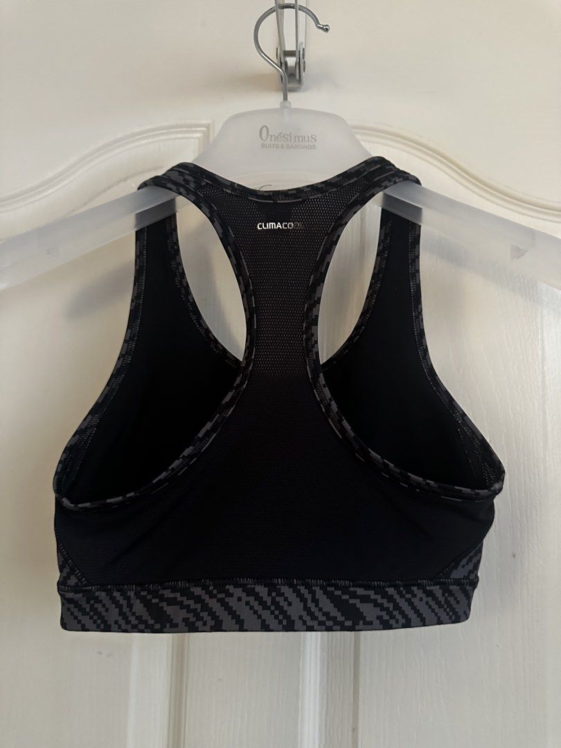 Adidas Techfit ClimaCool Sports Bra Black Grey Pattern (Category: Activewear) located in Manila. Submitted by nfcloset_ (Listing ID 1460793773, Image 2). Description: - Adidas Sports Bra - Black and grey geometric pattern - Features Techfit and ClimaCool technology for optimal performance and breathability - Racerback design for enhanced support during workouts - Comfortable and breathable material, ideal for active wear.