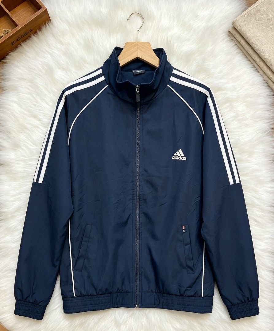 Adidas Track Jacket Navy Blue White Stripes (Category: Coats, Jackets and Outerwear) located in Manila. Submitted by momofunodos (Listing ID 1460832366, Image 1). Description: - Classic Adidas track jacket - Navy blue with white sleeve stripes - Full zip closure - Stand-up collarm - Two side pockets - Elasticated cuffs and hem - Ideal for casual wear or sports Note! buy at your own risk this is ukay kau n mg legit ✅.