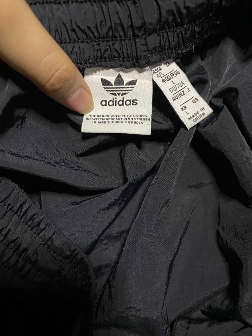 ADIDAS TRACKPANTS (Category: Joggers) located in Pasig City. Submitted by akithrift18 (Listing ID 1460799373, Image 2). Description: ITEM: ADIDAS TRACKPANTS Size fits: MEDIUM ADJUSTABLE W: 28-30 L: 40 Leg opening: 12 Issue: NO ISSUES Condition: GOOD Color rate: 9/10 GRAB: 2000 • Color may vary due to lighting • Location: Pasig City (NCR) • Courier: J&T Express • Mode of payment: G CASH/PAYMAYA • All items are thrifted/second hand please manage yo