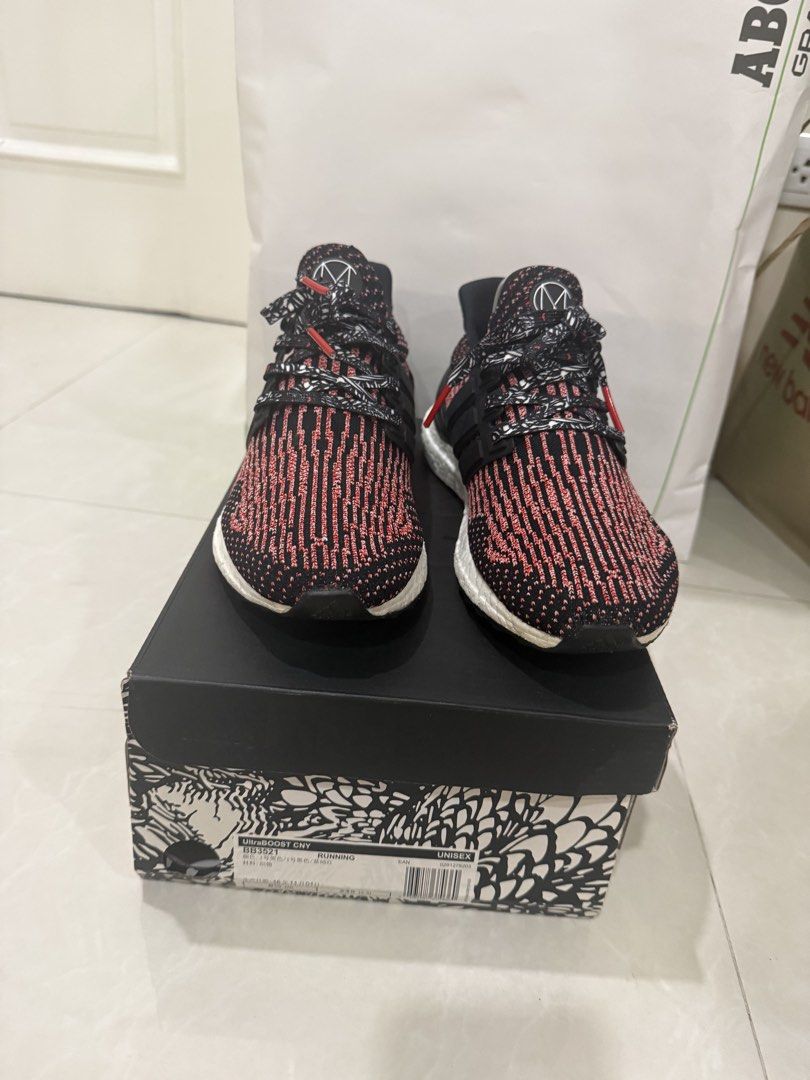 Adidas Ultraboost CNY (Category: Sneakers) located in Manila. Submitted by gmelendres18 (Listing ID 1460782470, Image 2). Description: - Adidas Ultraboost CNY - Size 7 US or 25cm - with box - no yellowing - rfs: not used anymore.