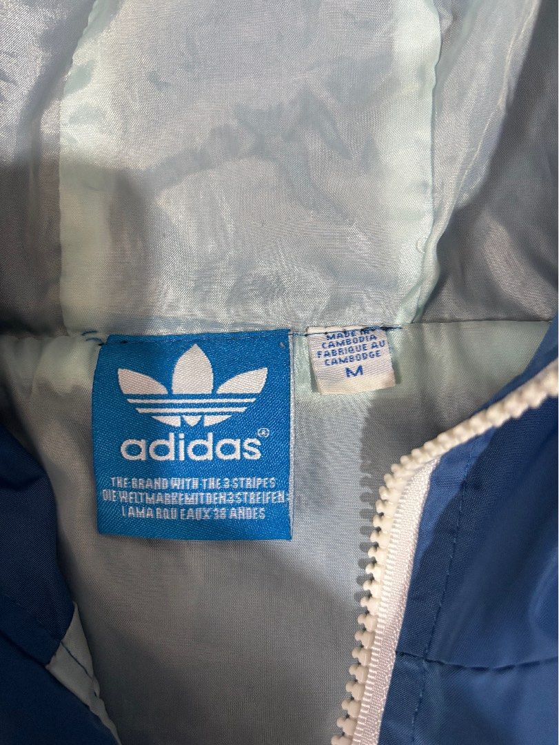 ADIDAS WINDBREAKER (Category: Coats, Jackets and Outerwear) located in Cagayan de Oro. Submitted by thriftcgyph (Listing ID 1460823669, Image 3). Description: ADIDAS WINDBREAKER ₱650 ISSUE FADED PRINTS ON ZIPPER COMPLETE TAGS M ON TAG COLOR RATE: 9/10 L : 21.5 x W: 24.5.
