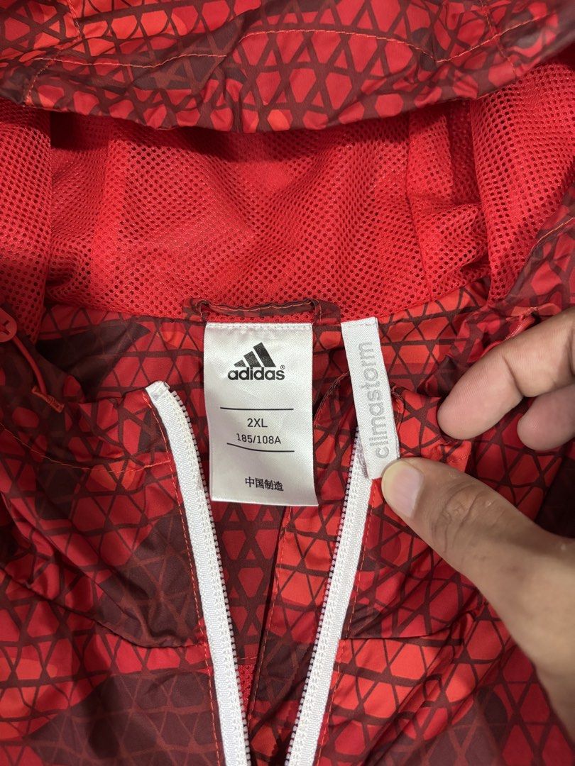 ADIDAS WINDBREAKER (Category: Coats, Jackets and Outerwear) located in Cagayan de Oro. Submitted by thriftcgyph (Listing ID 1460824423, Image 3). Description: ADIDAS WINDBREAKER ₱450 ISSUE STAIN COMPLETE TAGS 2XL ON TAG COLOR RATE: 9/10 L : 28 x W: 24.