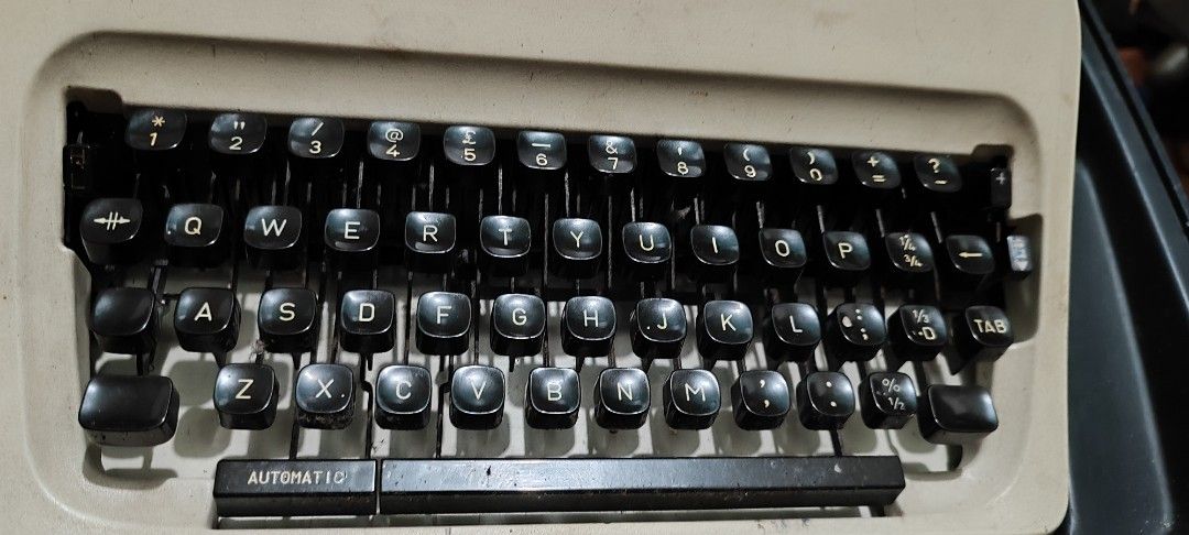 Adler Junior 12 Typewriter (Category: Other Stationery & Craft) located in Manila. Submitted by clintonpura (Listing ID 1460834673, Image 2). Description: - Vintage Adler Junior 12 typewriter - Includes original case - Ribbon spools are included - Perfect for collectors or mechanical typewriter lovers.