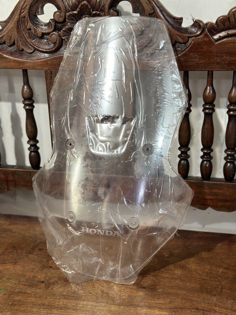 ADV 160 Honda Windshield (Category: Other Motorcycles Parts and Accessories) located in Manila. Submitted by cnmanaois19234 (Listing ID 1460781015, Image 1). Description: - Clear windshield for Honda motorcycles - Features embossed Honda logo - Pre-drilled mounting holes for easy installation - Shields rider from wind and debris Stock ito - original almost new tinaggal agad sa motor naka plastic pa .