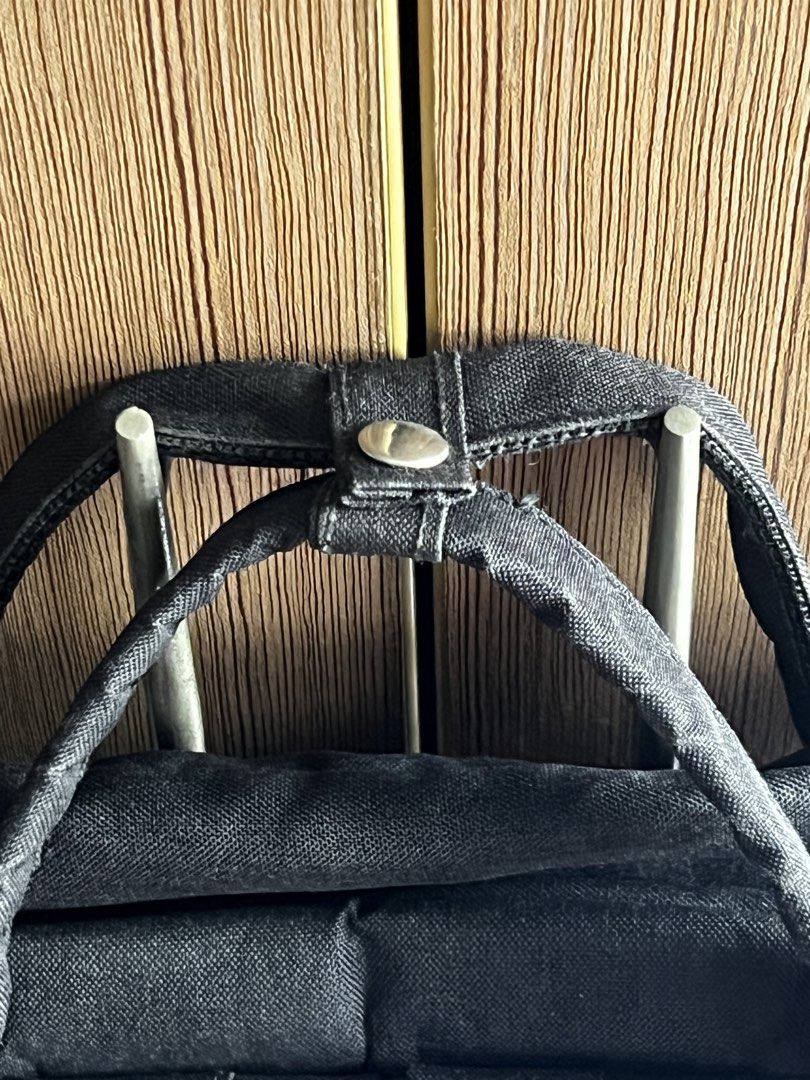 Adventure Supply Co. Black Backpack / 13" Laptop Bag with Multiple Compartments (Category: Backpacks) located in Manila. Submitted by honey.001 (Listing ID 1460745675, Image 3). Description: * Brand: Adventure Supply Company * Color: Classic Matte Black * Design: Anello-style square backpack silhouette with dual top handles and a snap-button closure strip * Capacity: Spacious main compartment that easily fits a 13-inch laptop, tablets, notebooks,