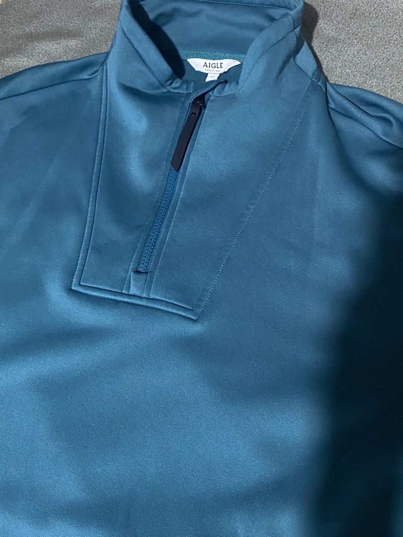 Aigle Quarter Zip Jacket XL Teal (Category: Coats, Jackets and Outerwear) located in Manila. Submitted by wheeze_2208 (Listing ID 1460827351, Image 3). Description: - Teal Aigle jacket - Size XL - Quarter zip with stand-up collar - Aigle logo on chest and zipper pull - Two working zipper side pockets - Designed for performance, functionality, and quality.