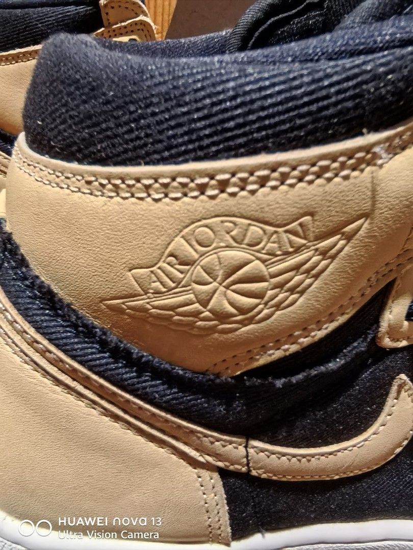Air Jordan 1 High OG "Light British Tan" (Category: Sneakers) located in Cebu City. Submitted by abellarces30419 (Listing ID 1460752521, Image 3). Description: - Authentic Air Jordan 1 retro high OG - Colorway: Vachetta tan leather black denim twill Original /Ukay2x source - Materials: Tan leather and black denim-like fabric - Design: Classic high-top silhouette - Iconic details: Air Jordan wings logo - Condition: Soles show some wear, but plenty