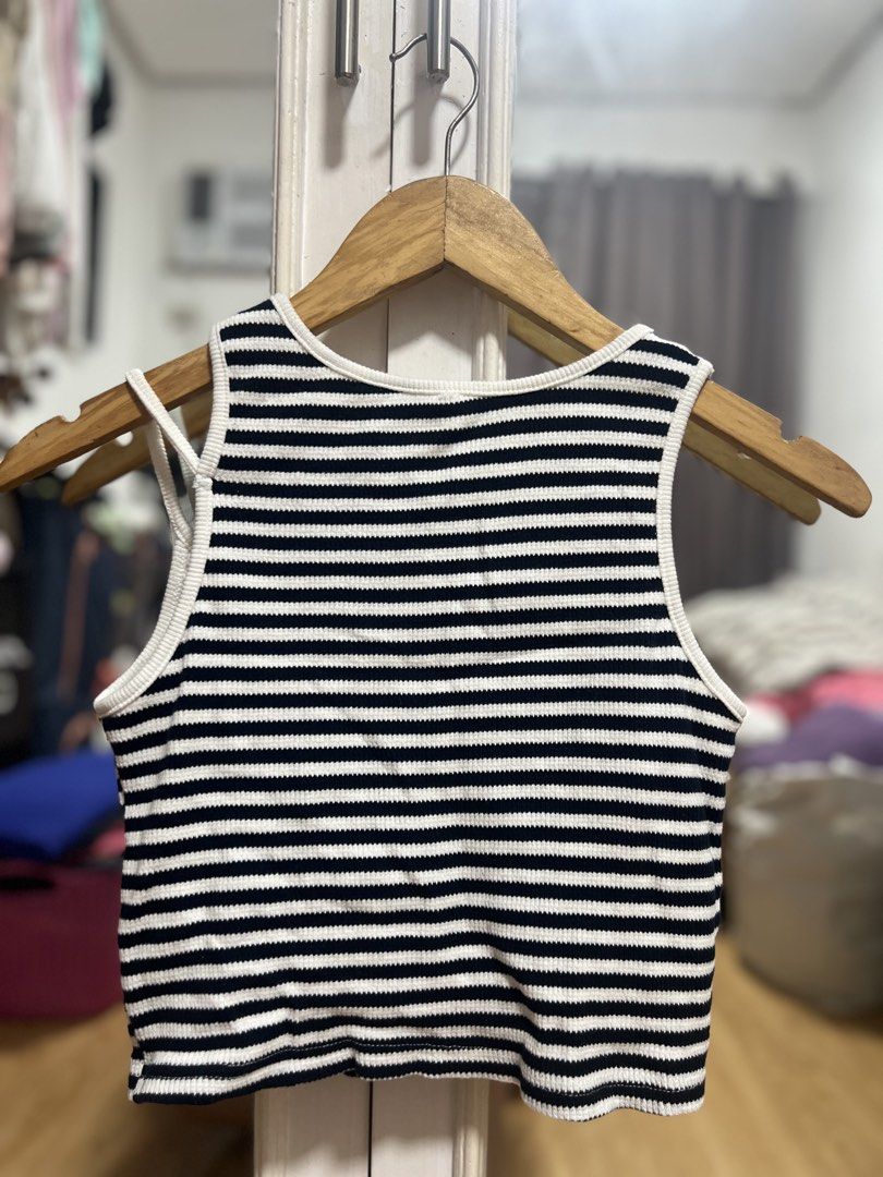 Air Space Striped Padded Cut-Out Crop Top (Category: Sleeveless) located in San Pedro. Submitted by chicmanila (Listing ID 1460870892, Image 2). Description: - Trendy black and white striped crop top - Features a stylish chest cut-out detail - Padded - Made from comfortable ribbed material - L on tag best fits M - Ideal for everyday casual wear.