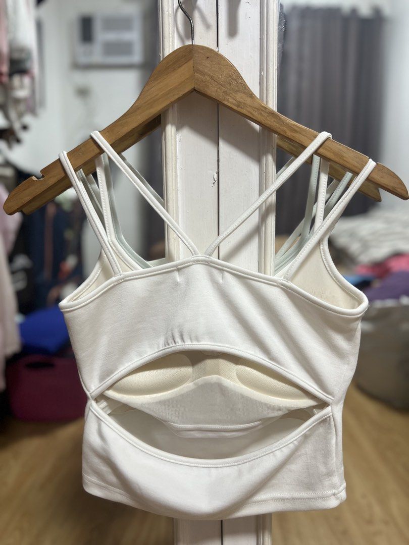 AIR SPACE White Padded Top (Category: Sleeveless) located in San Pedro. Submitted by chicmanila (Listing ID 1460867720, Image 2). Description: - Brand: AIR SPACE - Color: White - Padded - Size: Medium (M) on tag, best fits Small - Design: Criss-cross straps at the front - Detail: Cut-out at the back - No flaws.